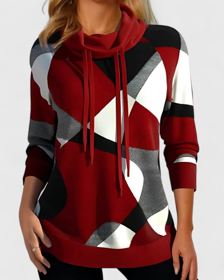 Moderner Damen Langarm-Pullover im Farbblock-Design mit Schalkragen. Stilvolle Strickmode für elegante Herbst- & Winter-Looks.