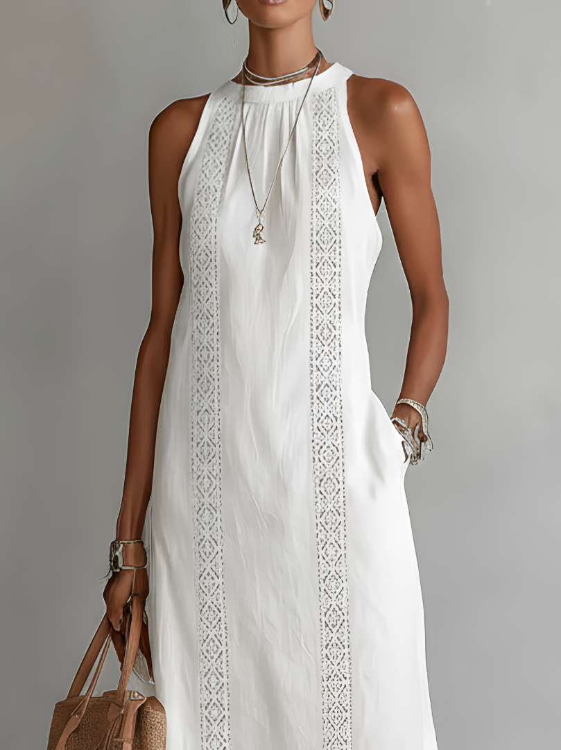 Langes Damen Sommerkleid, ärmellos und aufwendig bestickt. Ein vielseitiges Maxikleid für Damenmode.