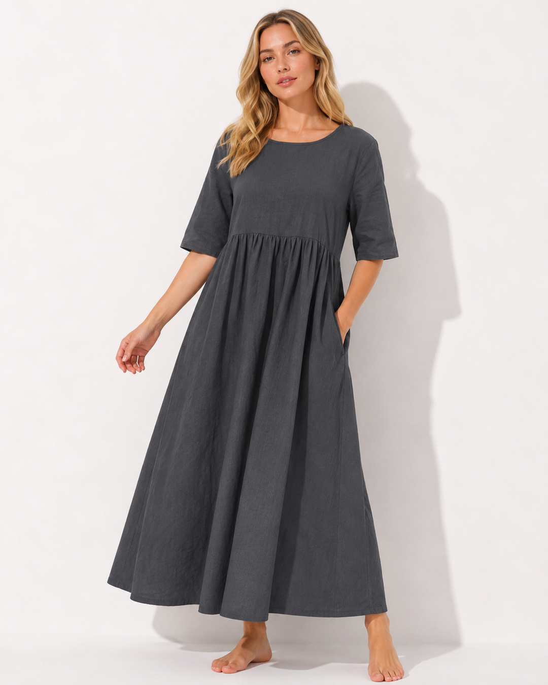 Damen Rundhalskleid mit Taschen, elegant & bequem, ideal für Freizeit & Sommer.