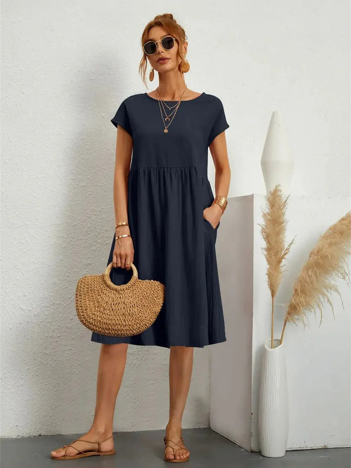 Modisches Damen Smock Midi Kleid, bequem und vielseitig. Perfekt für Freizeit & Alltag im Sommer.