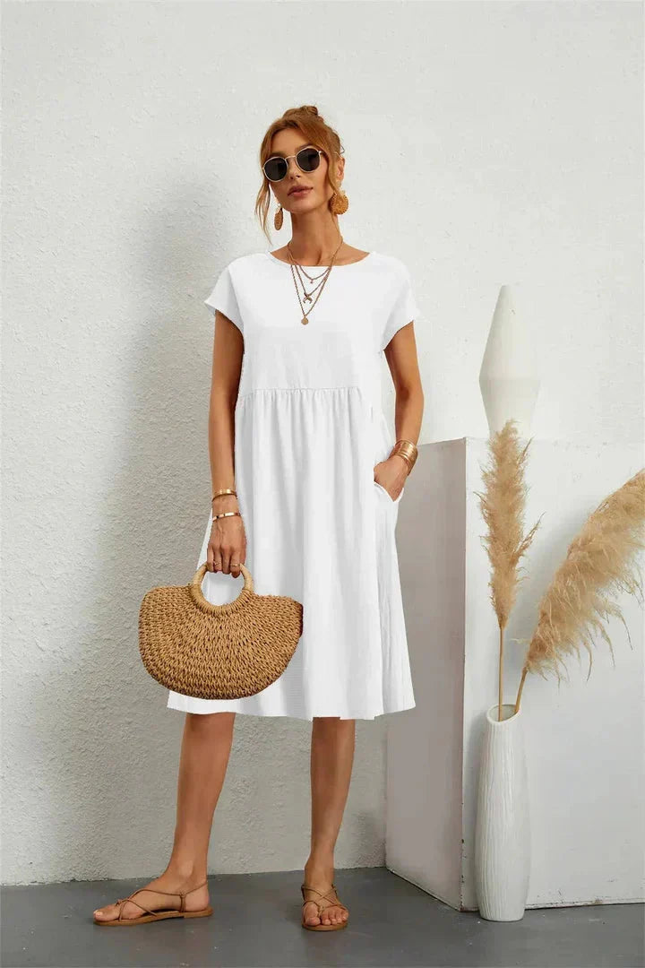 Stilvolles Damen Smock Midi Kleid. Ideal für Freizeit, bequemer Regular Fit. Perfekt als Sommerkleid.
