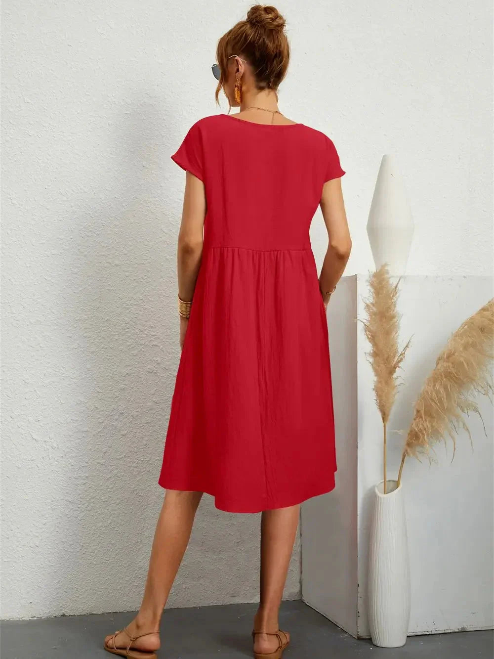 Modisches Damen Smock Midi Kleid mit Taschen. Ideal für Alltag & Freizeit, bequemer Regular Fit.