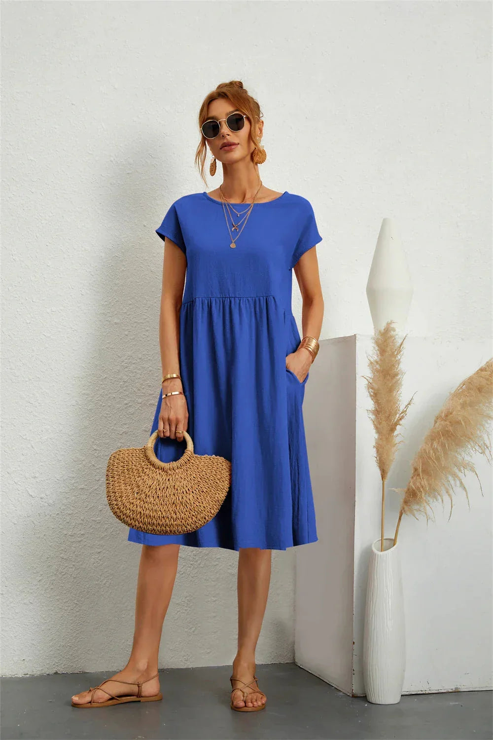 Damen Midi Smockkleid für den Sommer. Bequemer Regular Fit, perfekt für entspannte Freizeit & Alltag.