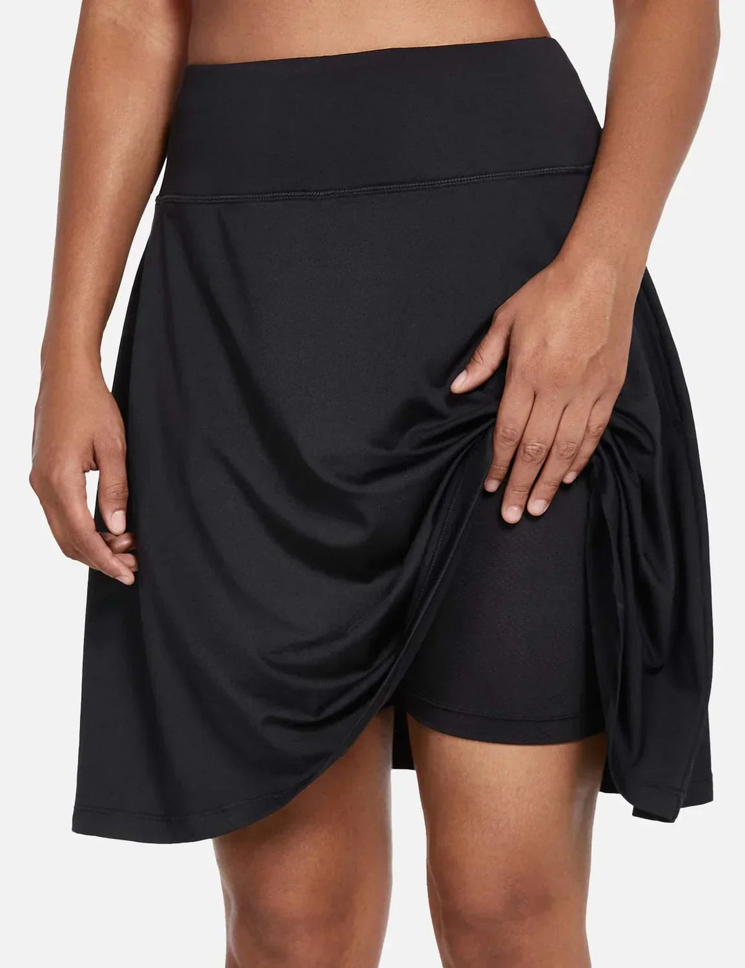 Damen Skort mit hohem Bund, Falten, UPF50+ Sonnenschutz & praktischen Seitentaschen.