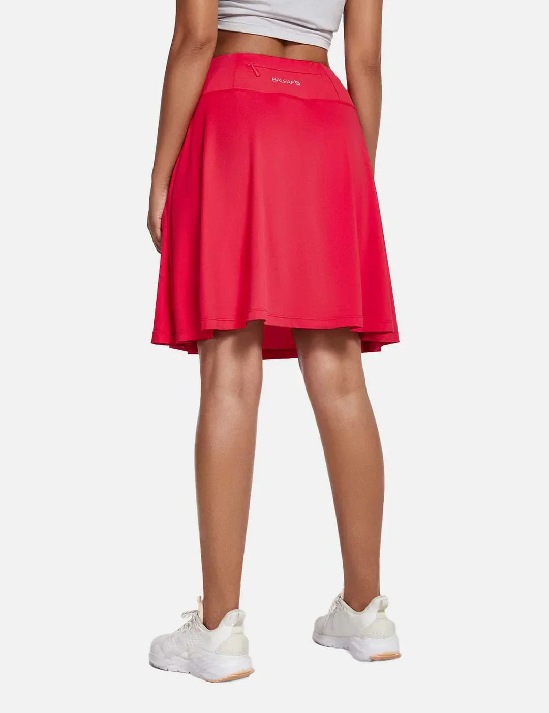 Damen Aktiv-Skort UPF50+ für Sport & Freizeit, mit hohem Bund, Falten & praktischen Taschen.
