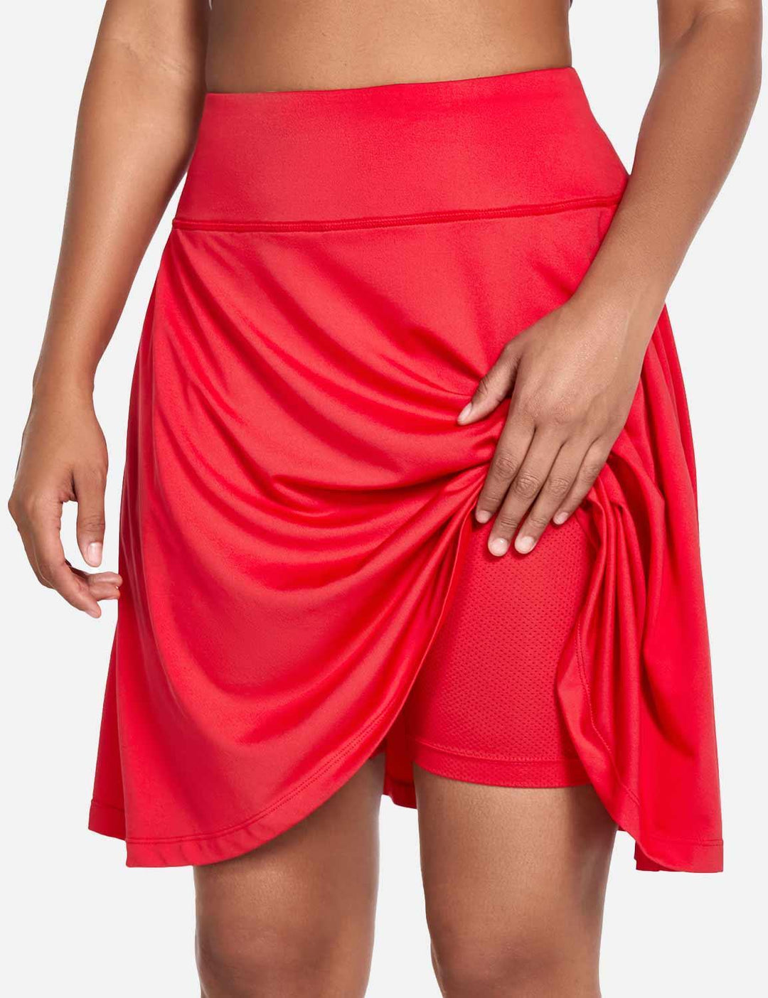 Atmungsaktiver Damen Skort mit hohem Bund, UV-Schutz UPF50+ & funktionalen Taschen.