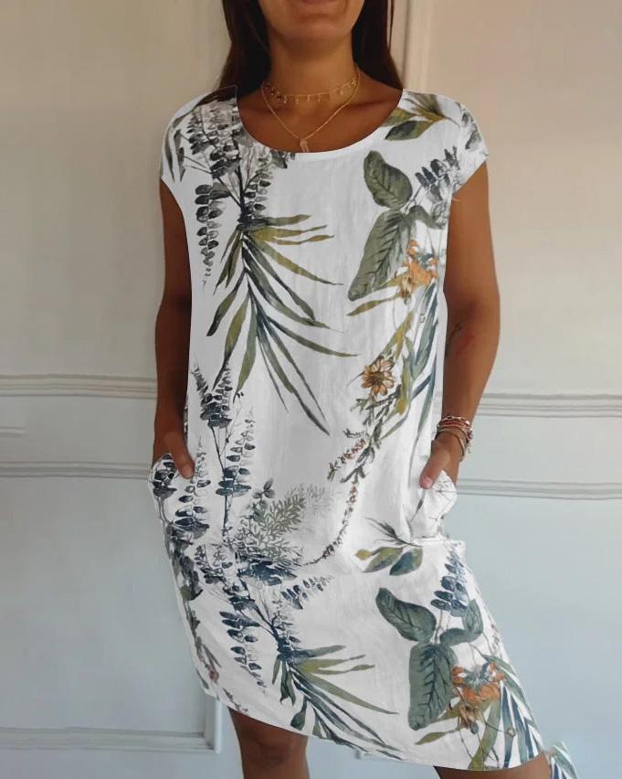 Damen Sommerkleid Tropisch: Rundhalskleid mit Taschen. Leichtes, bedrucktes Freizeitkleid für den Sommer.