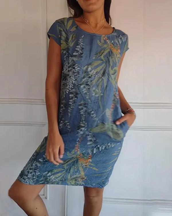 Vielseitiges Damen Sommerkleid tropisch. Rundhalskleid mit Taschen, perfekt als Freizeit- und Strandkleid.