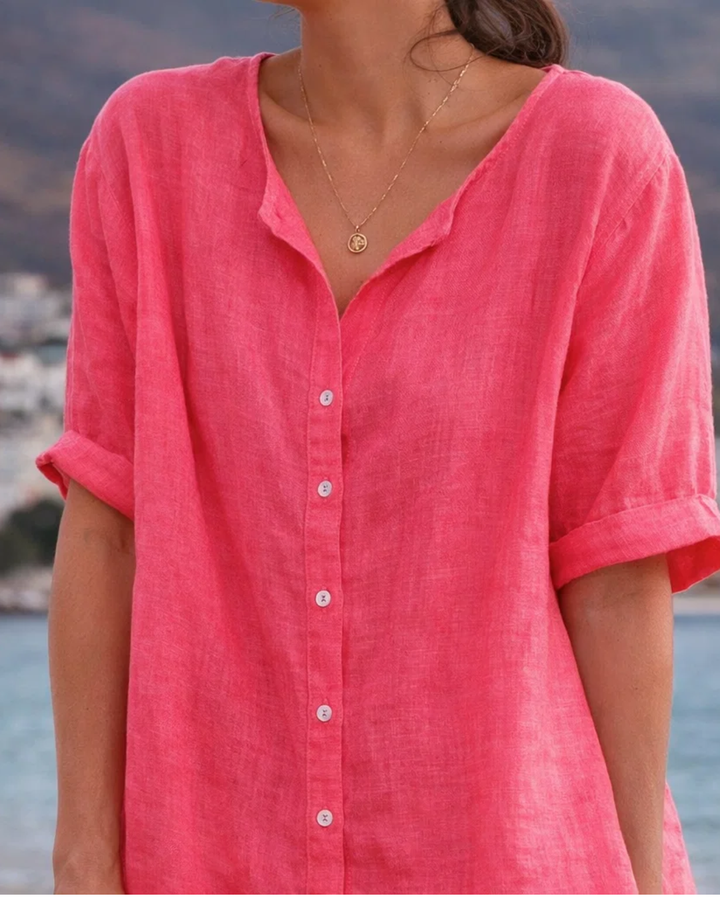 Modernes Damen Strandkleid mit Kurzarm, V-Ausschnitt und raffiniertem Knotendetail für den Sommer.