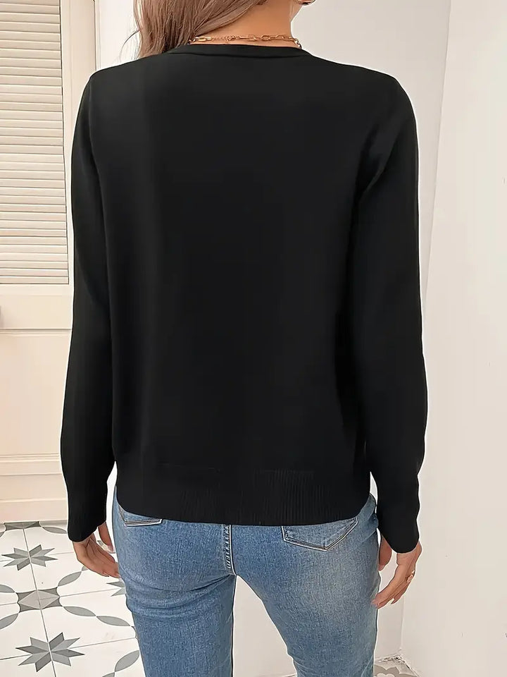 Modische Damen Strickjacke, eleganter V-Ausschnitt, perfekt für stilvolle Herbst- und Freizeitlooks.