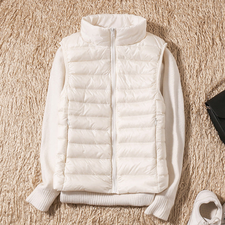 Feminine Damen Thermoweste: federleicht, winddicht & atmungsaktiv, für Komfort im Winter.
