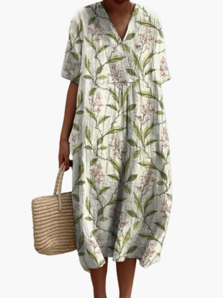 Elegant-legeres Damenkleid, Vintage Blumenprint, Midi-Länge, perfekt für Freizeit.