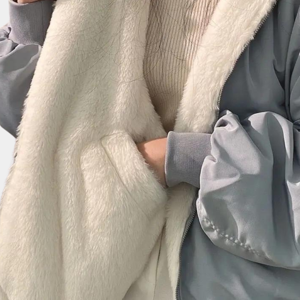 Graue Damen Winterjacke mit lockerem Schnitt, warm gefüttert. Perfekt für Casual Alltag und Outdoor-Aktivitäten.