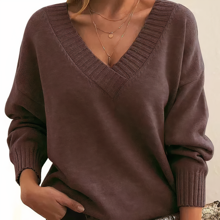 Weicher Damen Langarm-Strickpullover mit elegantem V-Ausschnitt. Hält warm und sieht stilvoll aus.