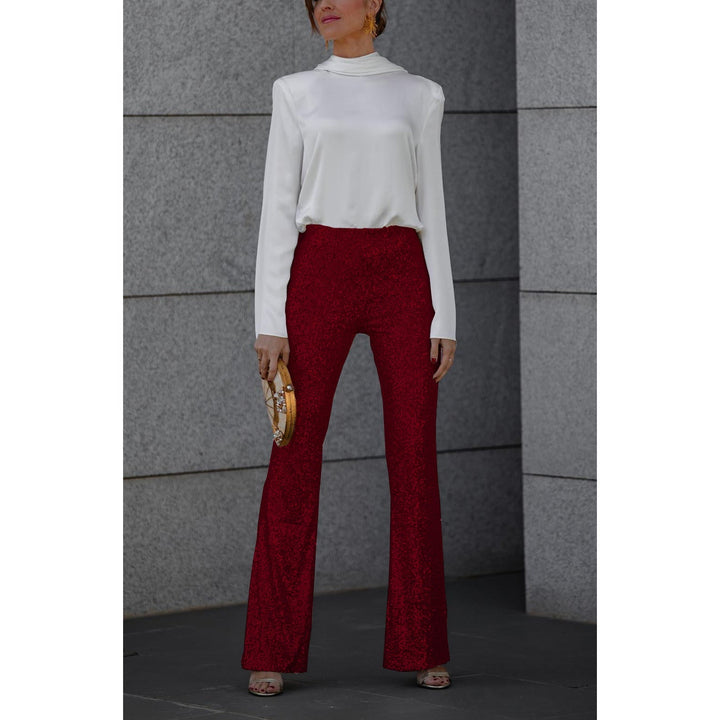 Funkelnde Schlaghose für Damen im glamourösen Retro-Stil. Perfekte Partyhose für besondere Anlässe.