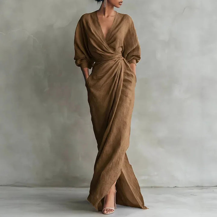Rosa elegantes Damen Wickel Maxikleid mit V-Ausschnitt und Langarm. Perfektes festliches Kleid für Anlässe.