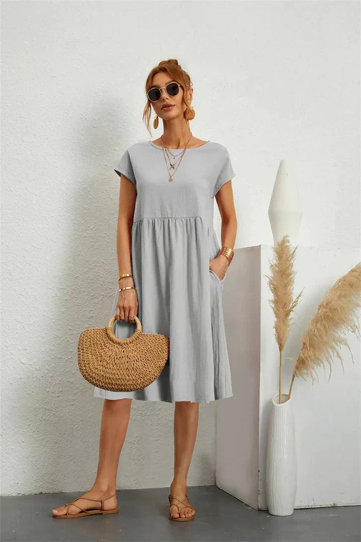 Vielseitiges Damen Kurzarmkleid mit Rundhals & Taschen, A-Linie, ein bequemer Sommer-Look für jede Gelegenheit.