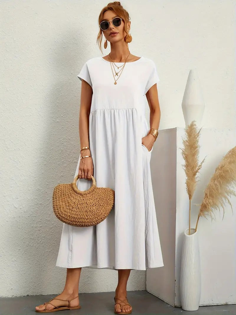 Damenkleid in Midi-Länge, ideal für den Sommer, mit seitlichen Taschen.