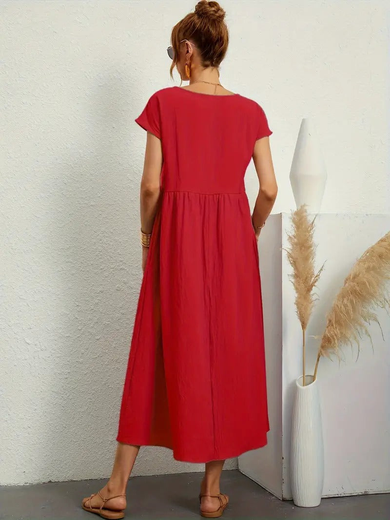 Luftiges Damen Sommerkleid, knielang, mit praktischen Taschen.
