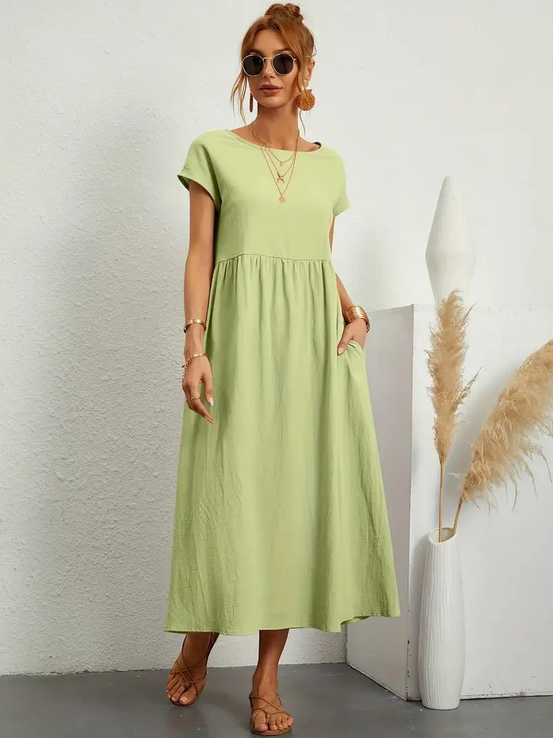 Leichtes Frühlings- und Sommerkleid, Midi-Länge, mit praktischen Taschen.
