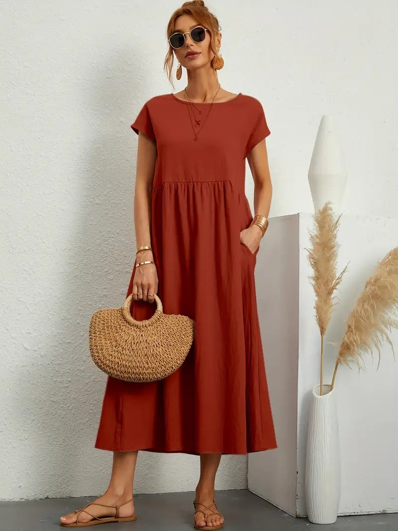 Fließendes Damen Sommerkleid, Midi-Länge, mit praktischen Taschen.