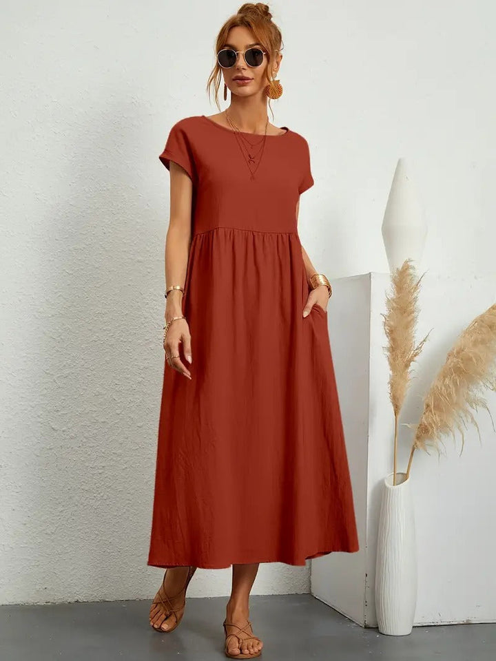 Elegantes Freizeit-Midikleid für Damen, mit bequemen Taschenzugriff.