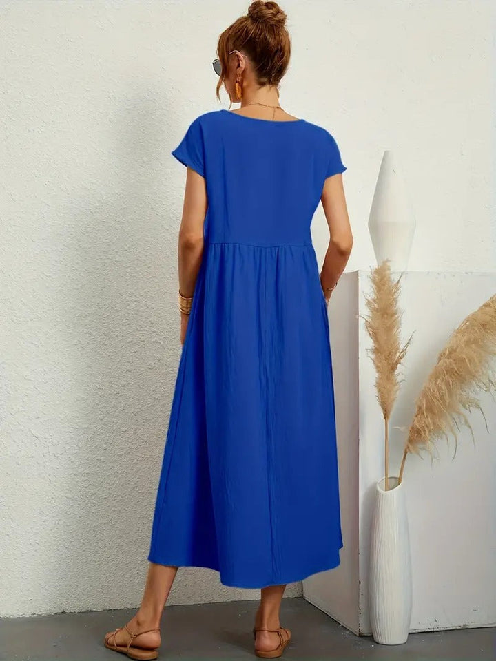 Leichtes Damenkleid mit Taschen, perfekt als elegantes Urlaubskleid.