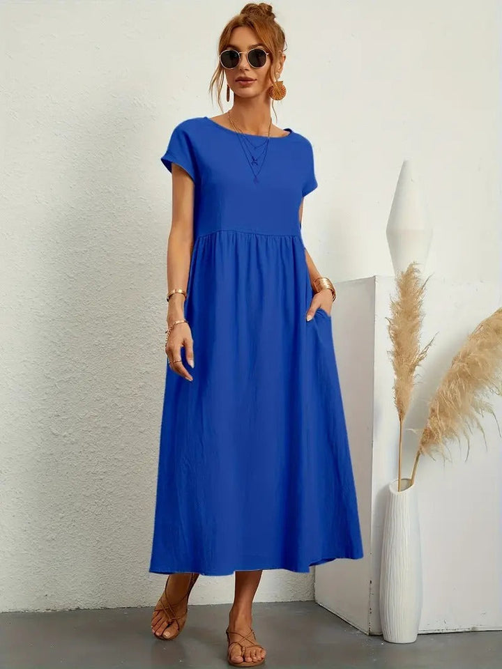 Bequemes Freizeitkleid, Midi-Länge, mit nützlichen Taschen für Damen.