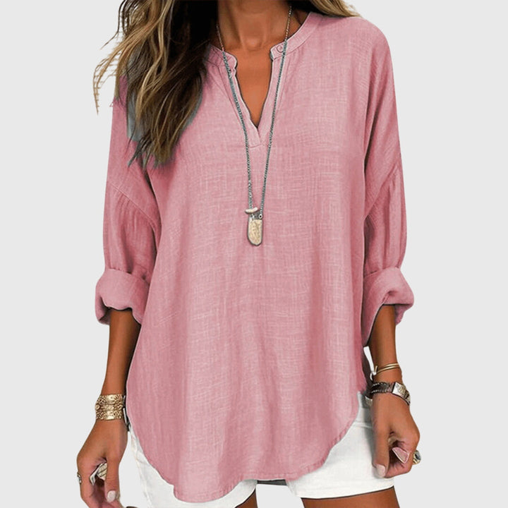 Bequeme Damen Freizeitbluse mit V-Ausschnitt und lockerer Passform, ideal als Sommer-Oberteil.