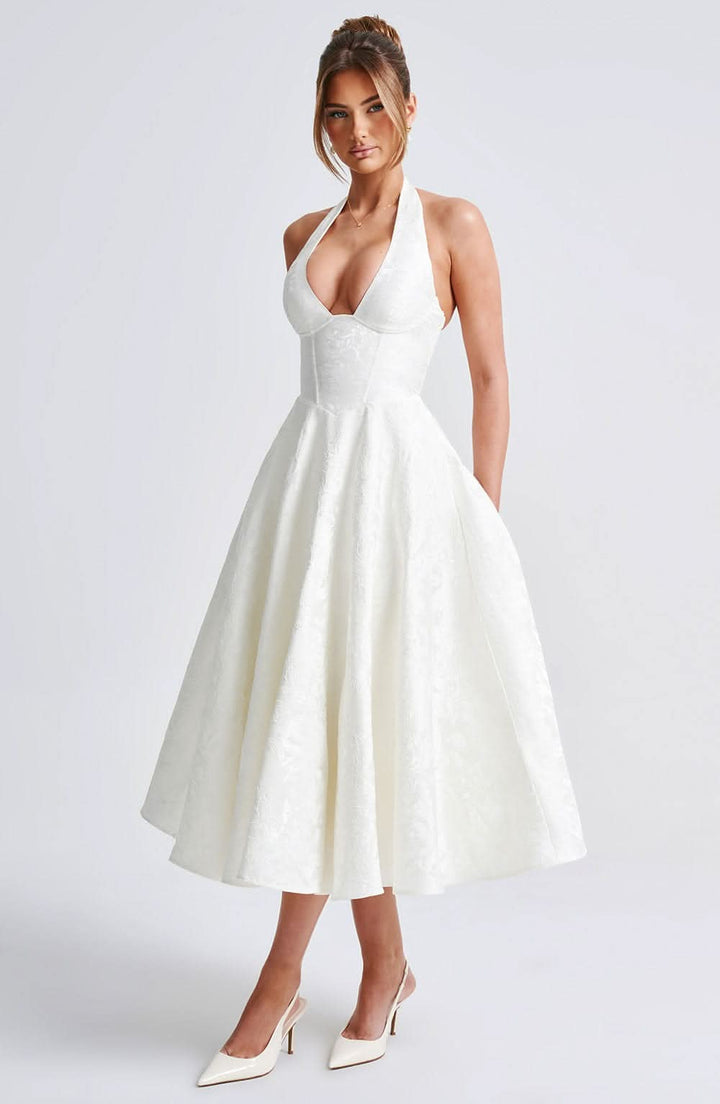 Edles Neckholder Midikleid in A-Linie, zeitlos und elegant, ideal für jeden festlichen Anlass.