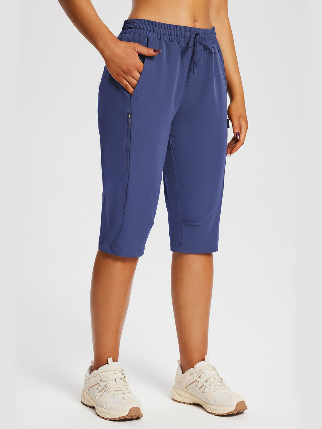 Robuste & komfortable Damen Wanderhose (Capris-Länge), atmungsaktiv & ideal für warme Tage.