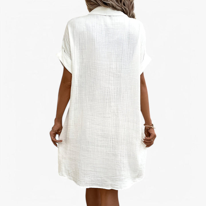 Modisches Damen Sommerkleid, einfarbig und wadenlang, ideal für Freizeit und entspannte Tage.