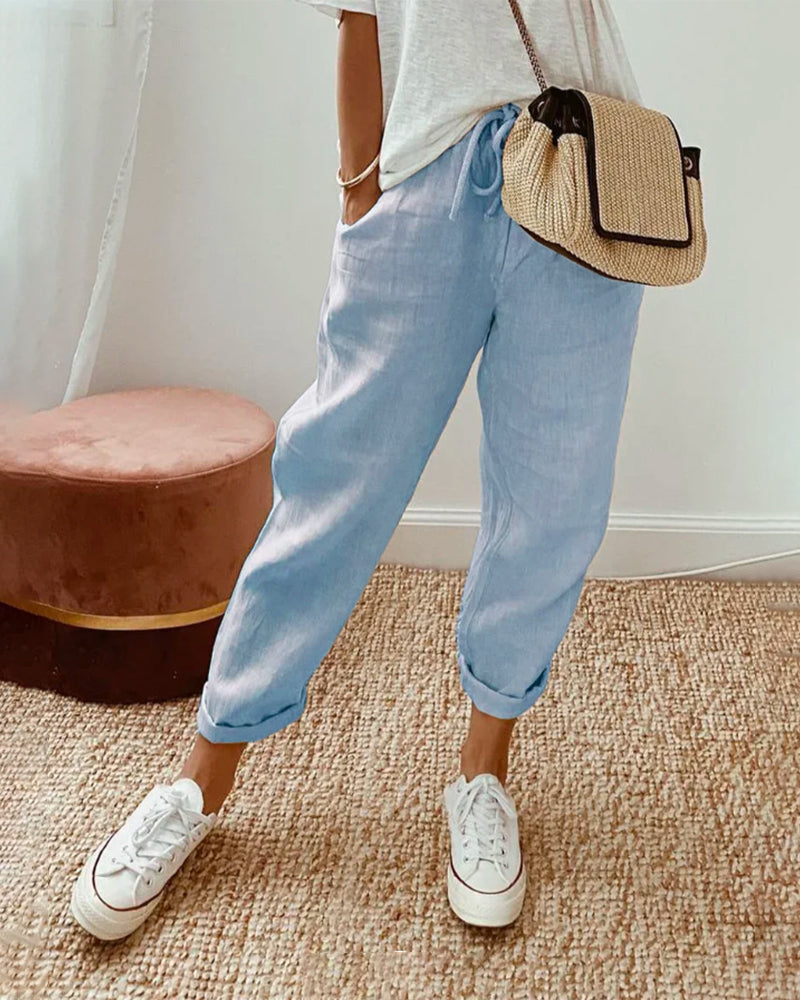 Bequeme, atmungsaktive Damenhose mit weitem Bein und hohem Bund. Lockerer, eleganter Schnitt für Frühling/Sommer.