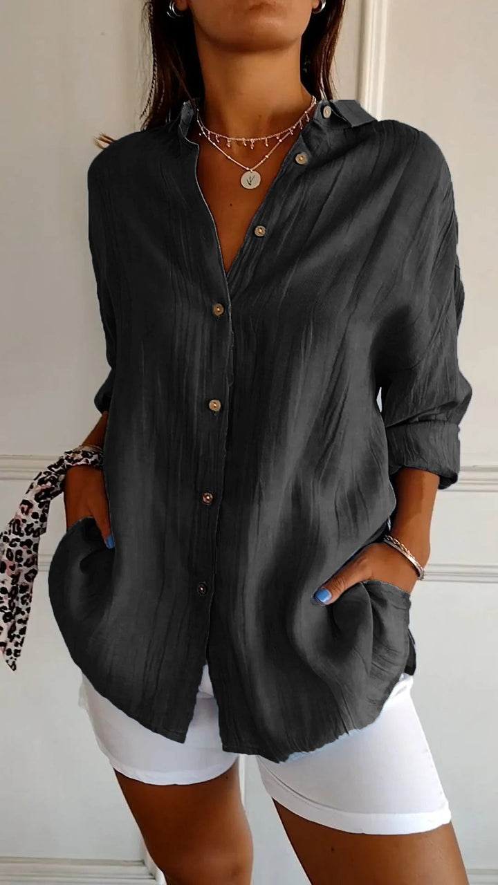 Damen Business Bluse: Eleganter Langarm-Schnitt, tailliert und mit feiner Faltenstruktur für Stil.