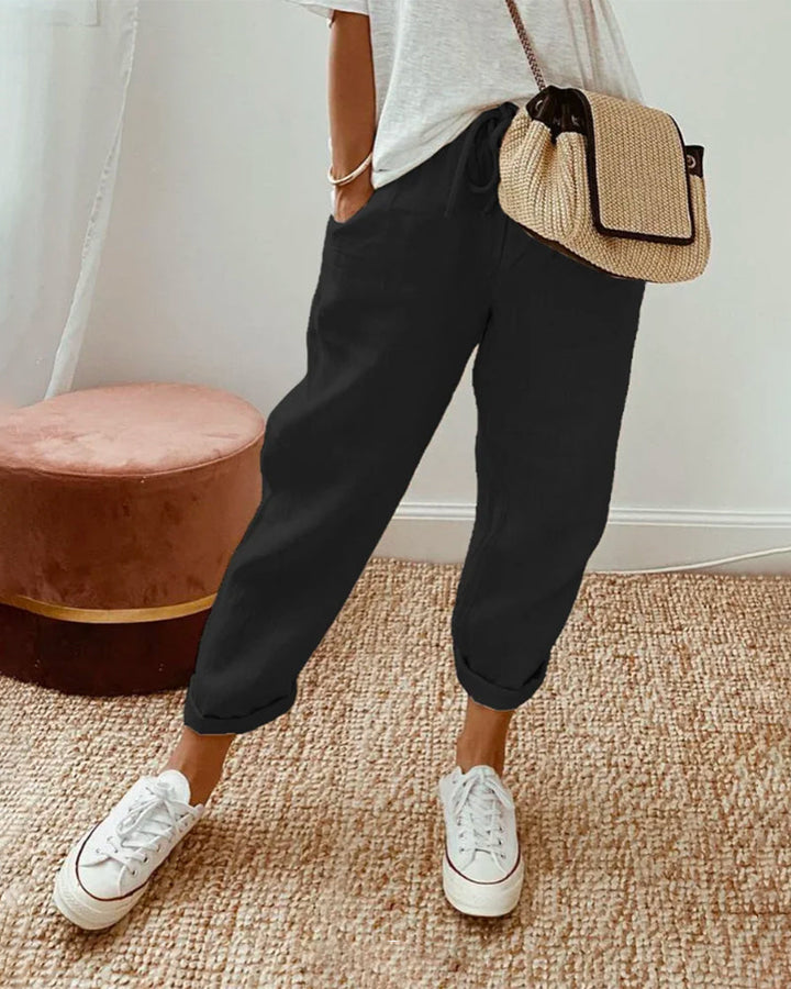 Moderne Damen High Waist Hose mit weitem Bein, elegant und komfortabel. Ideal für vielseitige Looks.