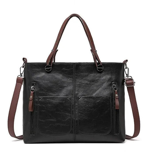 Die vielseitige Damen Organizer Tasche Ralaana aus Lederimitat in Schwarz, stilvoll, praktisch und alltagstauglich.