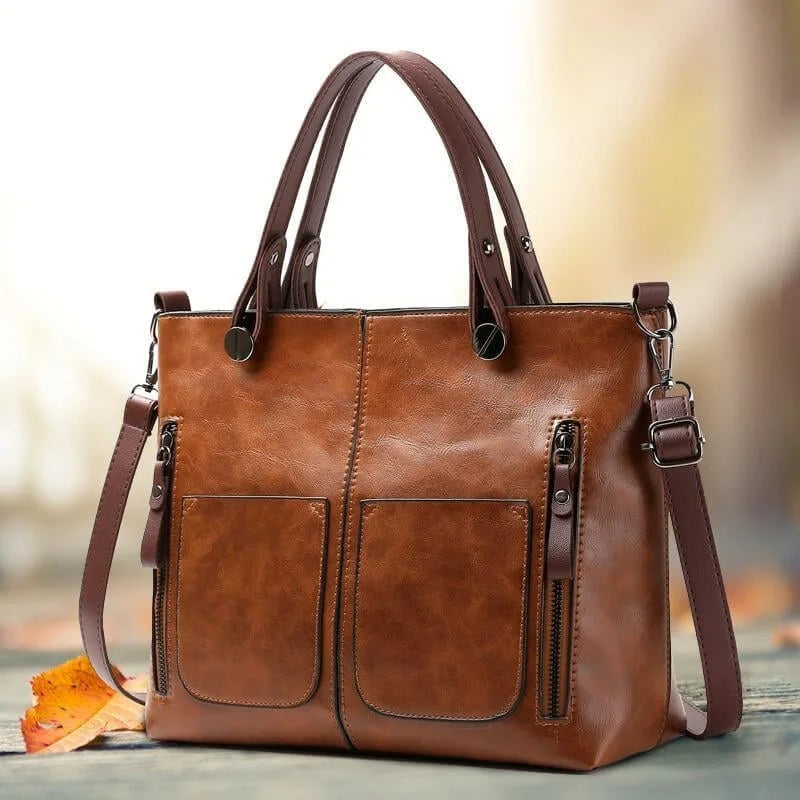 Stilvolle Damen Schultertasche Ralaana in Grau, gefertigt aus hochwertigem Lederimitat für den eleganten Look.