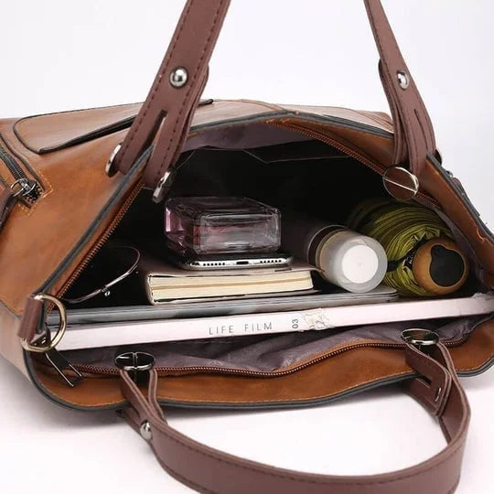 Trendiges Damen Accessoire: graue Kunstleder Schultertasche Ralaana, eine elegante und praktische Alltagstasche.