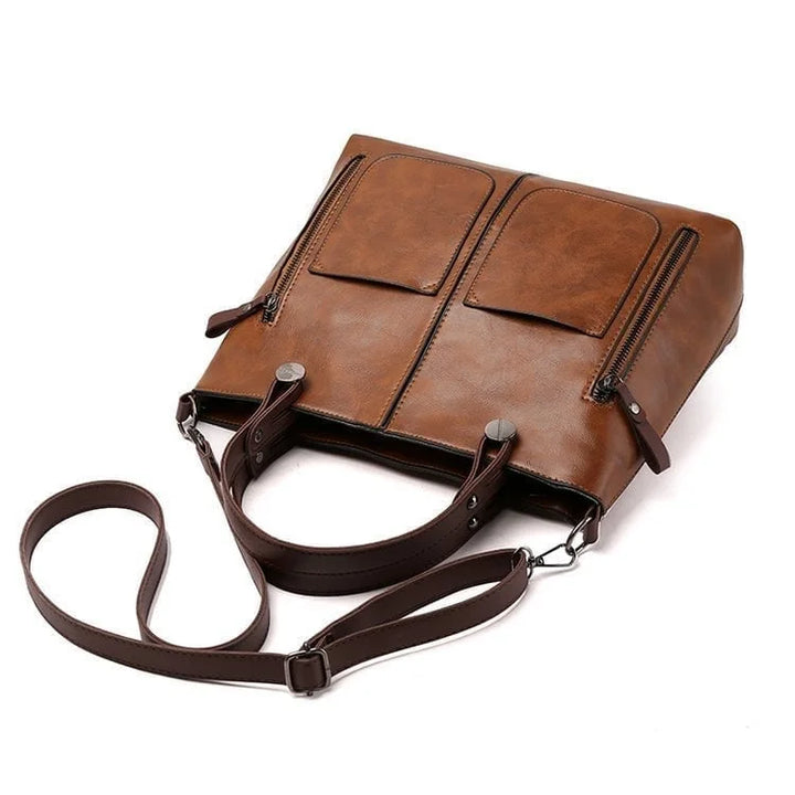 Robuste Damen Schultertasche Ralaana aus strapazierfähigem Lederimitat in Schwarz, ideal für täglichen Gebrauch.