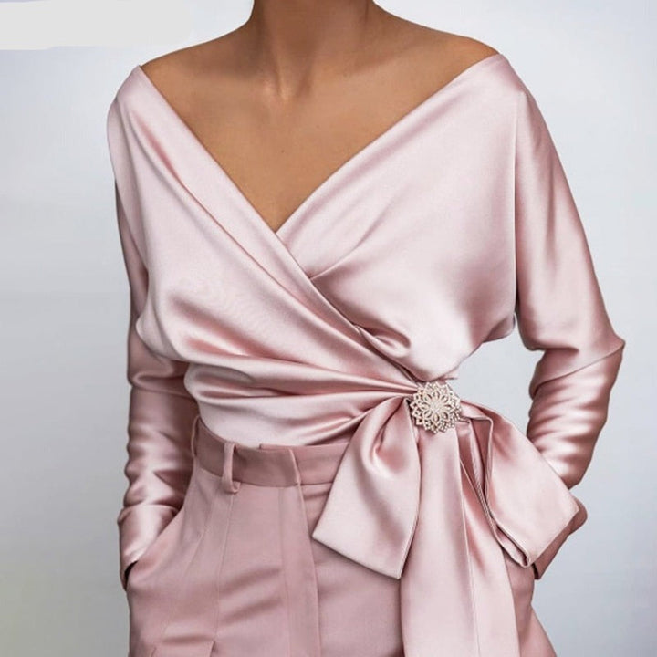 Stilvolle Damenbluse in elegantem Rosa. Vielseitiges Langarm-Oberteil für jeden Anlass, Frühling & Sommer.