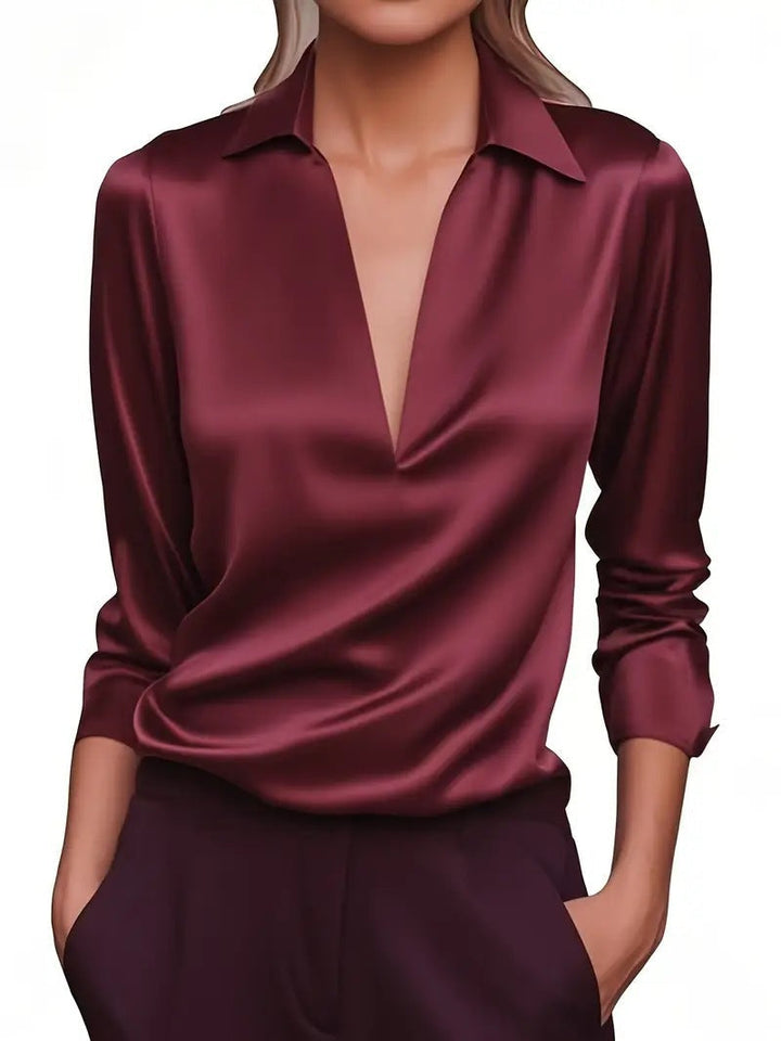 Zeitloses Design: Damen Bluse im Seiden-Look mit V-Ausschnitt, vielseitig kombinierbar.