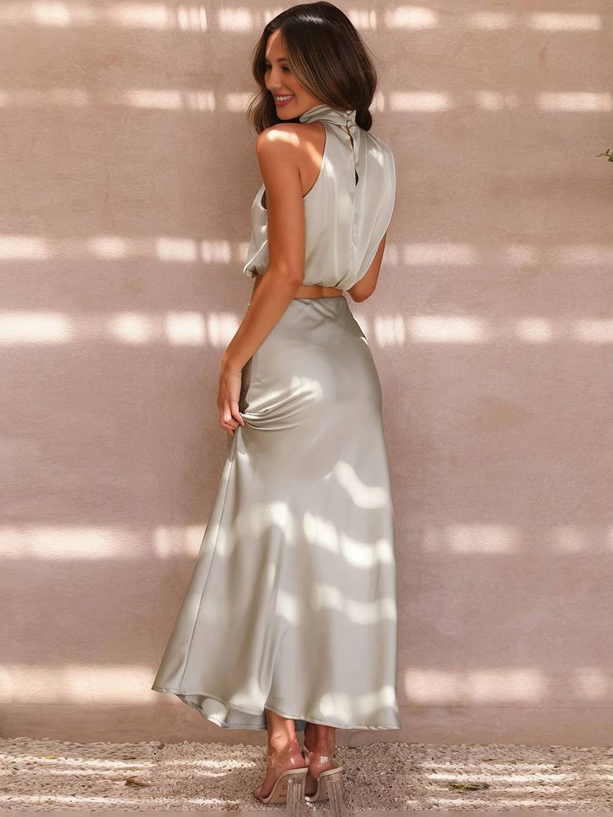 Detail des fließenden Maxi Rocks vom Damen Zweiteiler, perfekte Abendmode für Feiern.