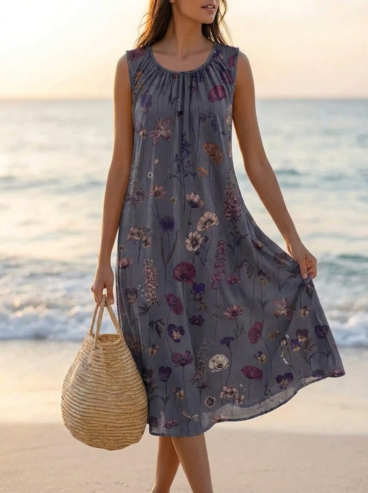 Elegantes Damen Blumen Midikleid für den Sommer. Ärmelloses Freizeitkleid mit mehrfarbigem Blütenmuster.