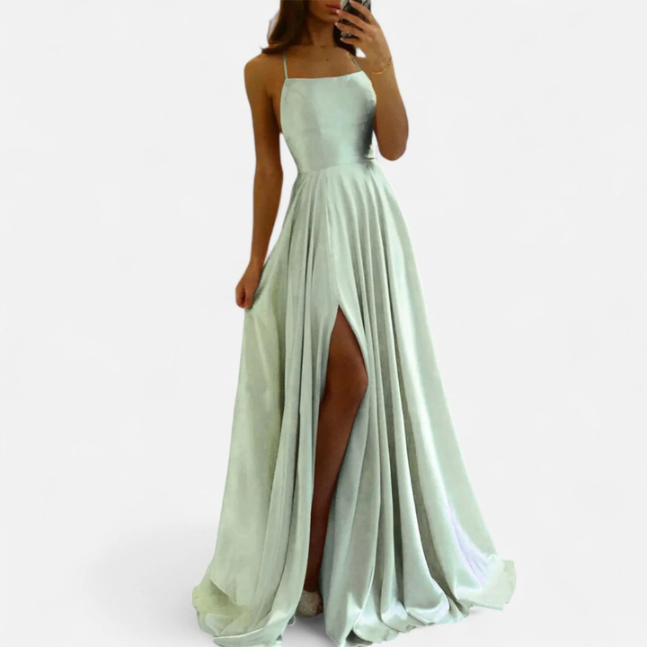 Textur des fließenden, eleganten Damen Maxi-Kleides, Langarm, festliches Herbstkleid für Hochzeitsgäste.