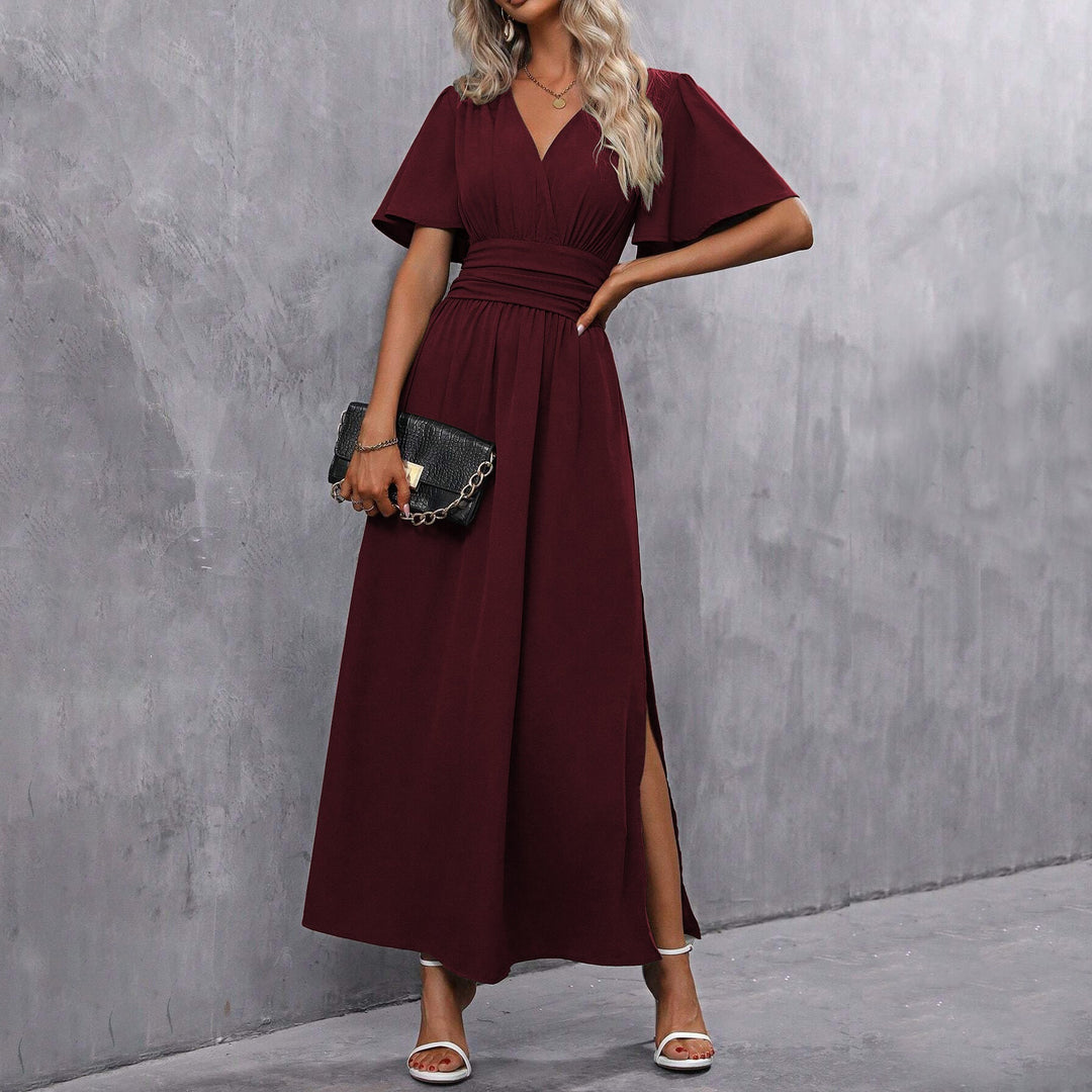 Boho Chic Damen Maxikleid mit Wickeldetail und V-Ausschnitt, vielseitig für festliche Anlässe.