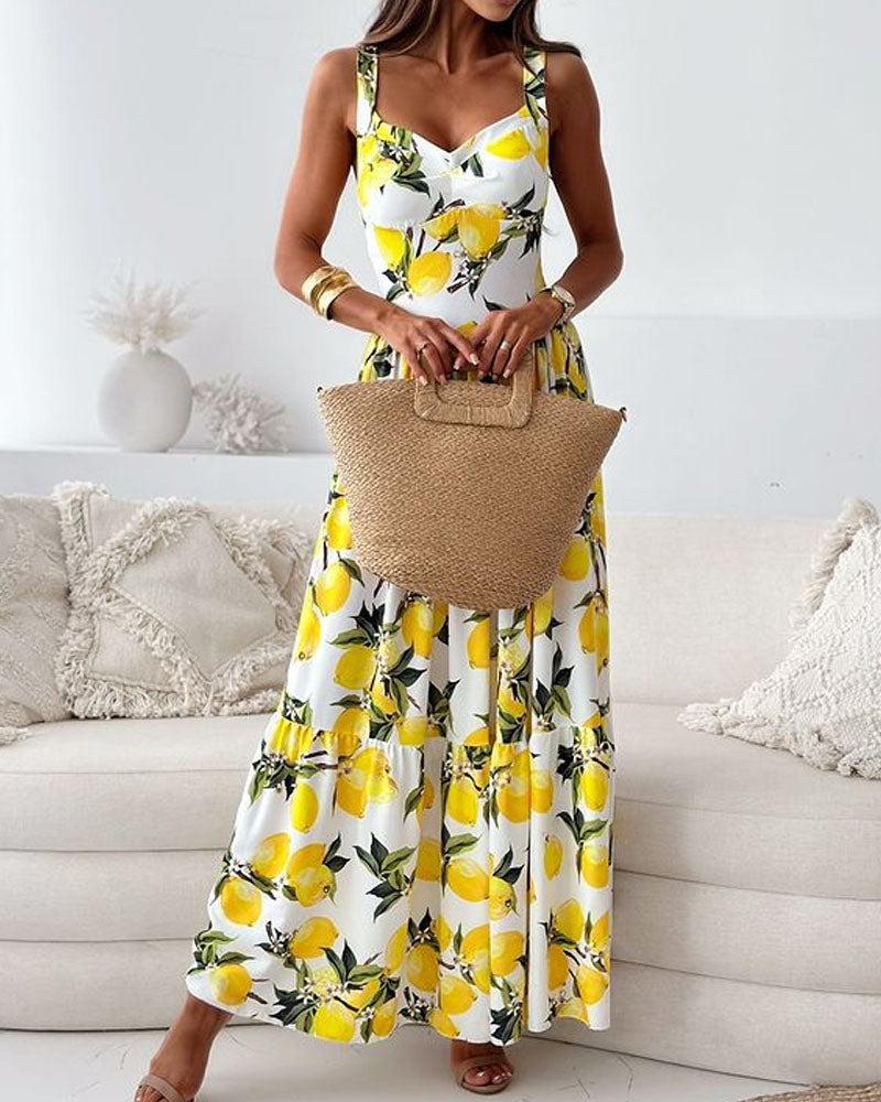 Elegantes Damen Maxikleid mit sommerlichem Zitronenmuster. Ein langes, gelbes Sommerkleid perfekt für Strand & Freizeit.