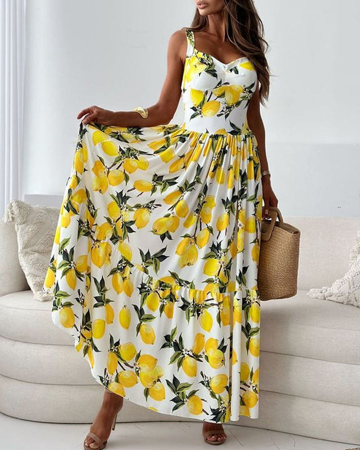 Gelbes Damen Maxikleid mit elegantem Zitronenmuster. Ein sommerliches, langes Kleid für Damen, perfekt für warme Tage.