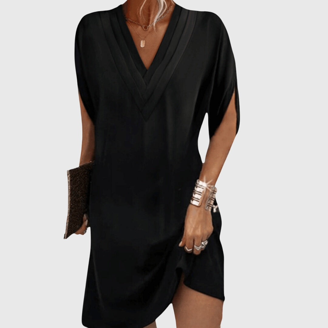 Elegantes Damen Midi Kleid mit V-Ausschnitt, locker fallend und kurzärmelig. Ideal für Abend und Freizeit.