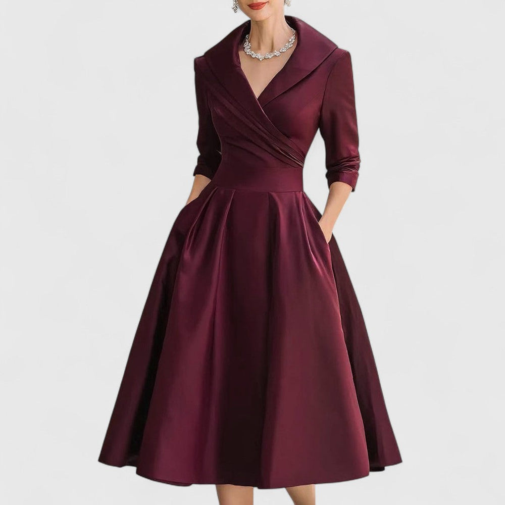 Marineblaues Damen Midikleid, elegant, mit ausgestelltem Rock. Ideal als Cocktailkleid oder für festliche Gelegenheiten.