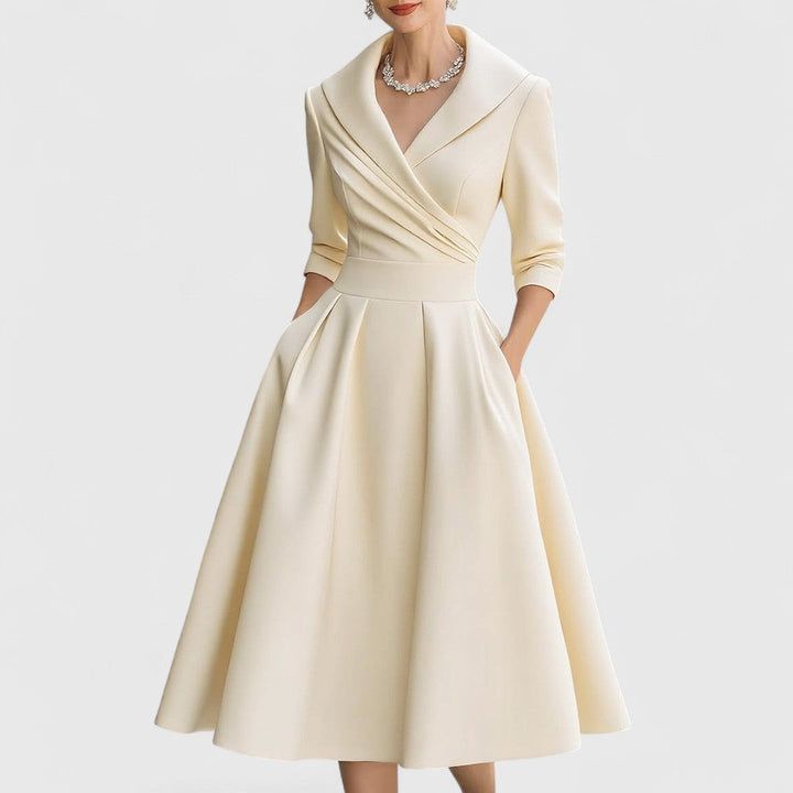 Lila Damen Midikleid, elegant & stilvoll. Das perfekte Cocktailkleid mit ausgestelltem Rock für Frauen.